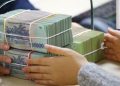 Ngân hàng Nhà nước bơm mạnh tiền qua Tết sau nới room tín dụng